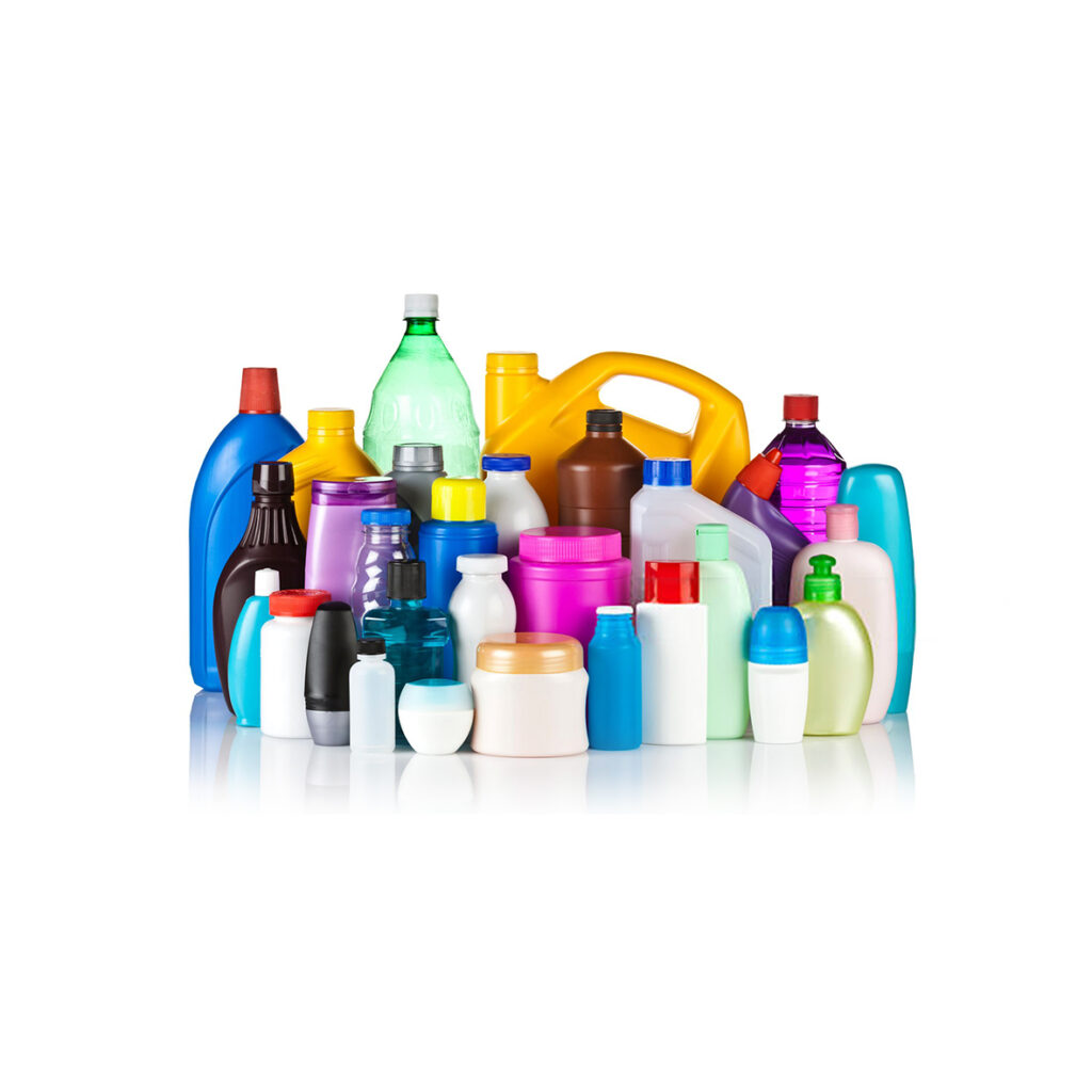 A large group of multicolored plastic bottles and containers standing on white backdrop. Bottles are of different sizes, shapes and colors and the bigger are in the background while the smaller are in the foreground.  The bottles are reflected in the foreground. Studio photo taken with DSRL Canon EOS 5D Mk II