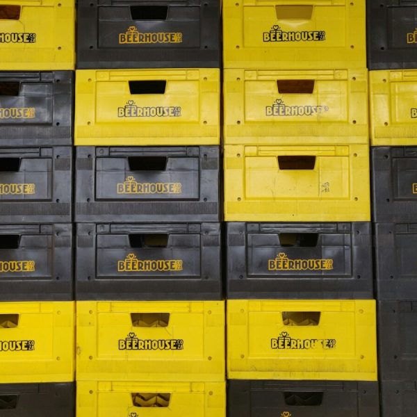 yellow and black plastic crates